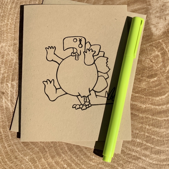 Zombie Stegosaurus card on kraft cardstock, blank inside