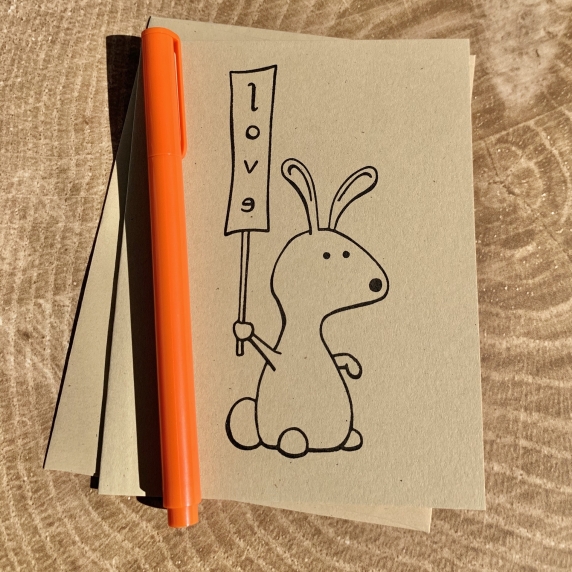 Bunny cartoon notecard on kraft cardstock, blank inside