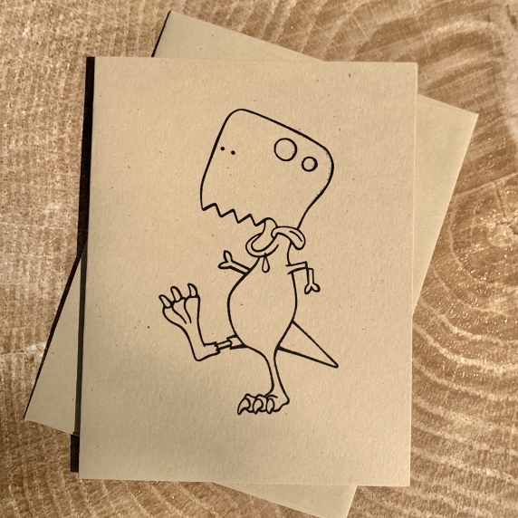 Zombie T. rex card on kraft cardstock, blank inside