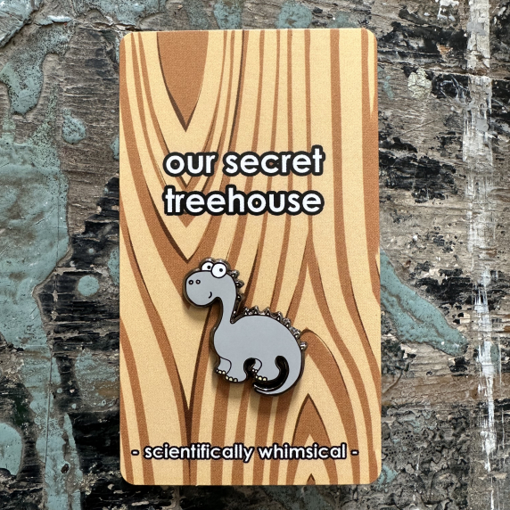 Brontosaurus Enamel Pin on printed cardstock