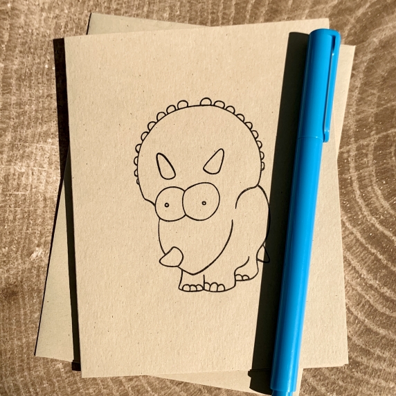 Triceratops notecard on kraft cardstock, blank inside