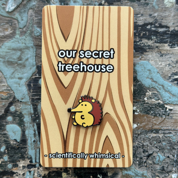 Hedgehog Enamel Pin on printed cardstock