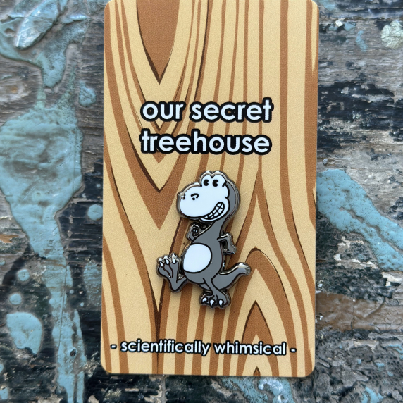 T. rex Enamel Pin on printed cardstock