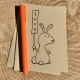 Bunny cartoon notecard on kraft cardstock, blank inside
