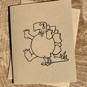 Zombie Stegosaurus card on kraft cardstock, blank inside