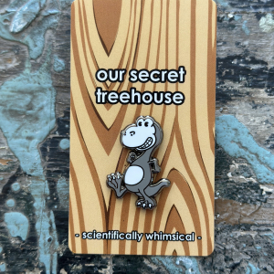 T. rex Enamel Pin on printed cardstock