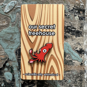Giant Squid Enamel Pin on printed cardstock